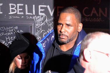Musician R. Kelly leaves his Chicago studio on February 22, on his way to surrender to police. AP