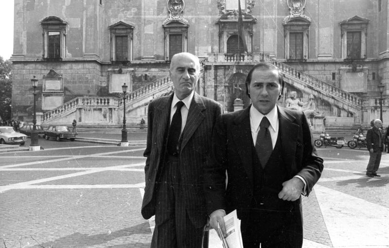 Mr Berlusconi with journalist Indro Montanelli in Rome, 1977. Getty