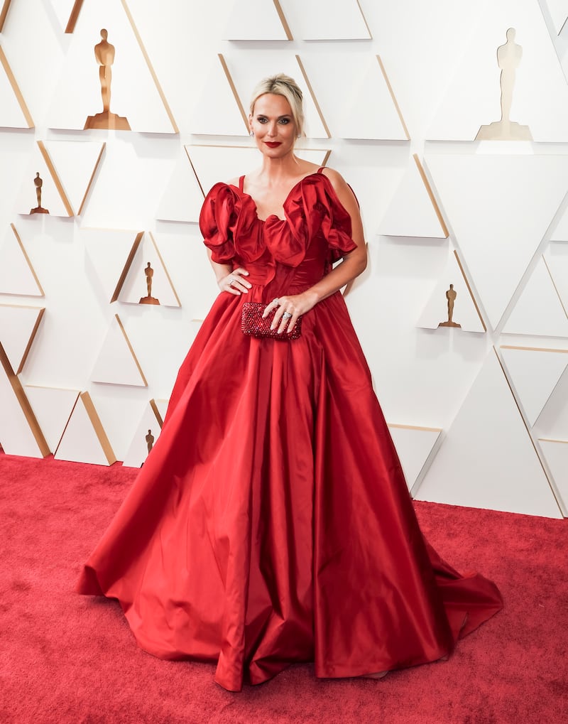 Molly Sims, wearing red Elie Saab. EPA