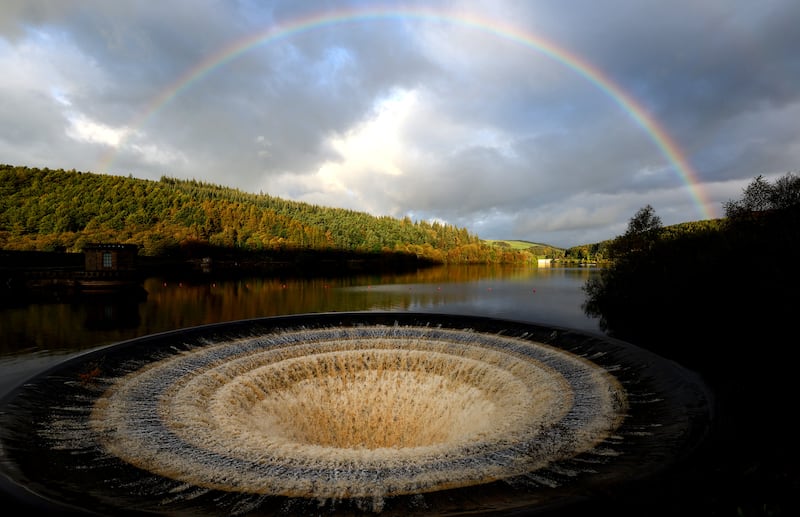 A rainbow over Ladybower Reservoir as water rushes down one of its 'plug holes' after heavy rain in Castleton, Derbyshire. Reuters