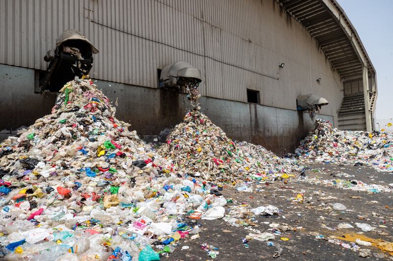 Solid waste bound for landfill in the yard of the material recovery building at the Beeah waste management complex in Sharjah. Bloomberg