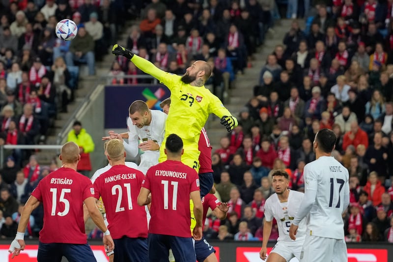 Vanja Milinkovic-Savic punches a cross during Serbia's Nations League match against Norway. EPA