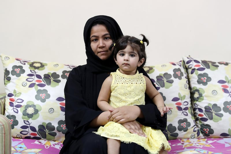 DUBAI ,  UNITED ARAB EMIRATES , May 15 – 2019 :- Nida Qamar with her 2 years old daughter Eshal who needs heart surgery at her apartment in Karama in Dubai. ( Pawan Singh / The National ) For News. Story by Nick Webster