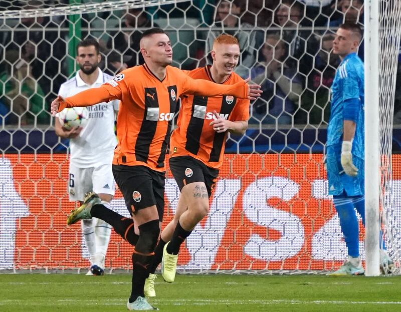 Shakhtar Donetsk's Ukrainian forward Oleksandr Zubkov celebrates after giving his side the lead in the 1-1 draw with Real Madrid in Warsaw on October 11, 2022. AFP