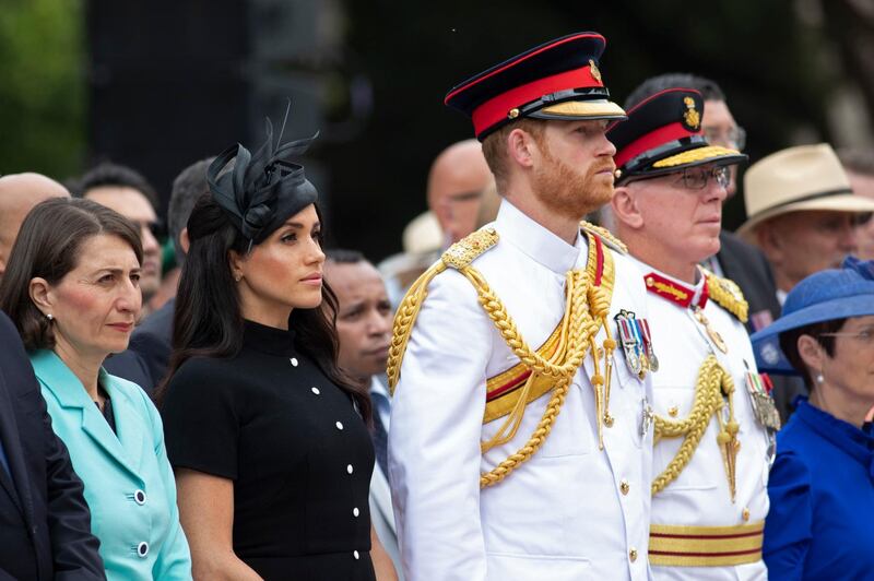 Prince Harry, centre right, and his wife Meghan, centre left, the Duchess of Sussex attend the opening of Anzac Memorial AP