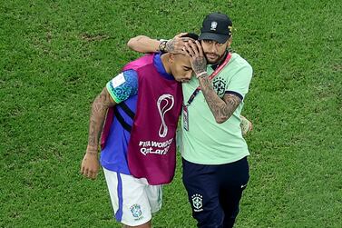 Brazil's forward #10 Neymar (R) congratulates Brazil's forward #18 Gabriel Jesus at the end of the Qatar 2022 World Cup Group G football match between Cameroon and Brazil at the Lusail Stadium in Lusail, north of Doha on December 2, 2022.  - Brazil's is qualified for the round of 16 even after loosing against Cameroon 0 - 1.  (Photo by Giuseppe CACACE  /  AFP)