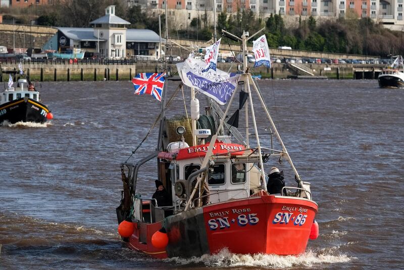 NEWCASTLE UPON TYNE, ENGLAND - MARCH 15: A flotilla of fishing boats from the Fishing For Leave protest group arrive at the Quayside area of the River Tyne on March 15, 2019 in Newcastle Upon Tyne, United Kingdom. Fishing for Leave are supporting other Pro-Brexit groups who are calling for the Government to scrap the Withdrawal Agreement and for MP's to ensure that Britain leaves the EU with no deal. The flotilla marks the official launch of the 'March to Leave' walk that begins the following day and will make its way to London in 14 stages arriving on March 29, the original date for the UK to leave the European Union. (Photo by Ian Forsyth/Getty Images)