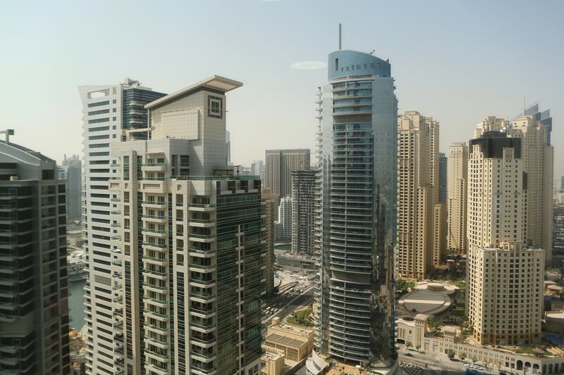 For Dubai, JLL is predicting a further decline in sale prices for residential units of about 5-10 per cent in 2016. Pictured, Dubai Marina. Sarah Dea / The National