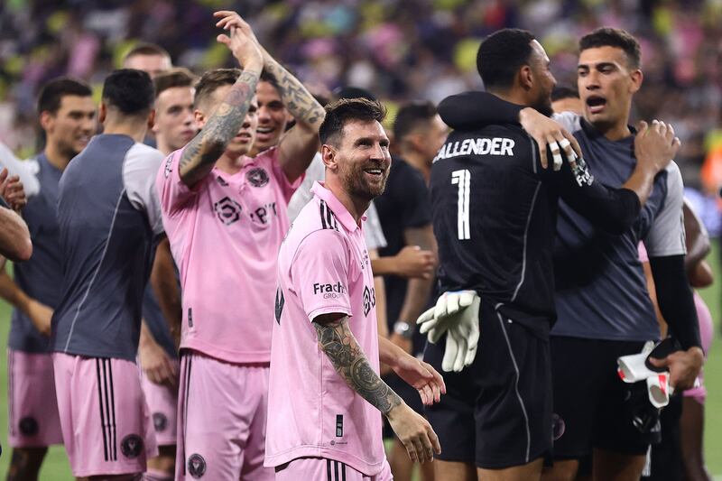 Lionel Messi celebrates on the pitch after Inter Miami's victory over Nashville in the Leagues Cup final. Getty