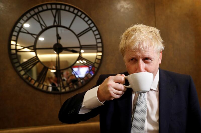 Boris Johnson, a leadership candidate for Britain's Conservative Party, visits a tea shop in Oxshott, Surrey, Britain, June 25, 2019. REUTERS/Peter Nicholls     TPX IMAGES OF THE DAY