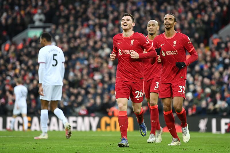 Andrew Robertson celebrates Liverpool's second goal scored by Alex Oxlade-Chamberlain. Getty Images