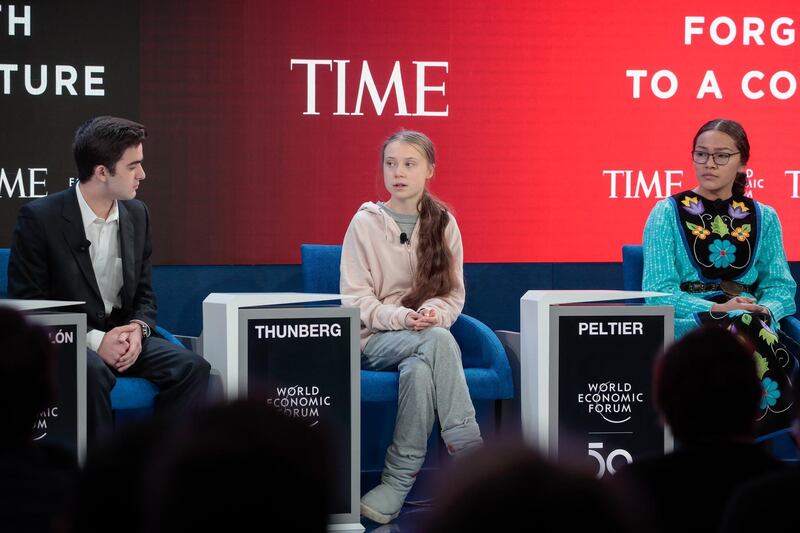 Salvador Gomez-Colon, founder of Light & Hope for Puerto Rico, Greta Thunberg, climate activist, and Autumn Peltier, chief water commissioner of the Anishinabek nation, take part in a panel session on the opening day of the World Economic Forum in Davos. Bloomberg