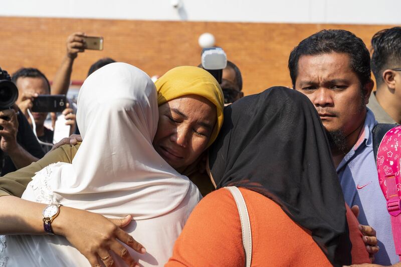 Relatives comfort each other at the crisis centre at Soekarno-Hatta International Airport in Cengkareng, Jakarta. Bloomberg