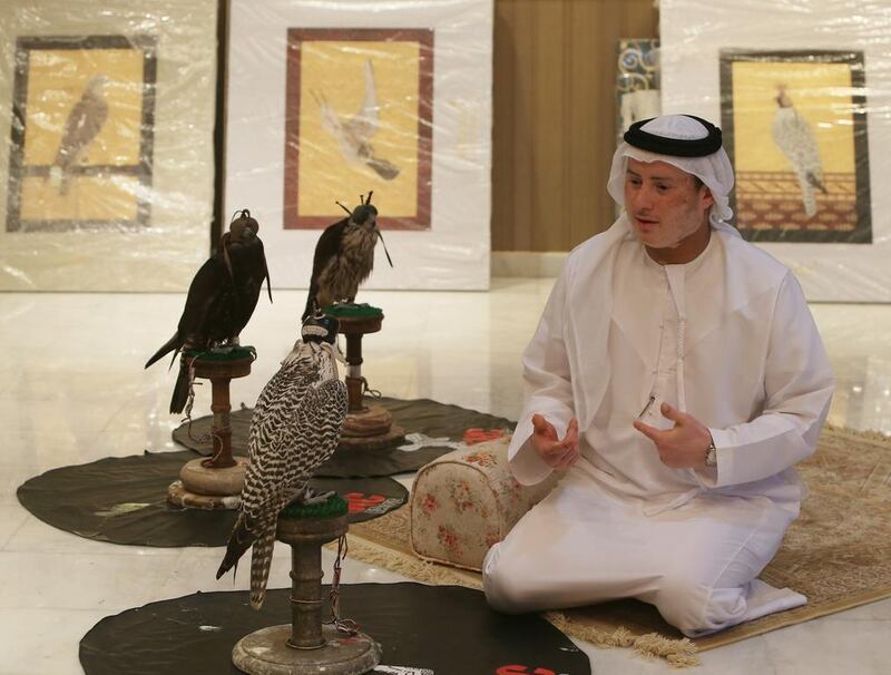 ABU DHABI - UNITED ARAB EMIRATES - 21SEPT2014 - Salem al Dhabari, with his hunting falcons in his residence at Shakhbout city in Abu Dhabi. Ravindranath K / The National (to go with Anna story for News)
