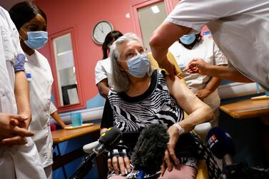 Mauricette, 78, becomes the first person in France to receive a dose of the Pfizer-BioNTech Covid-19 vaccine at Rene-Muret hospital in Sevran, a suburb of Paris. EPA