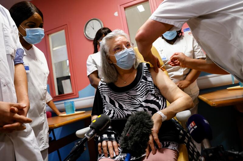 epa08905790 Mauricette, a French 78-year-old woman, receives a dose of the Pfizer-BioNTech COVID-19 vaccine at Rene-Muret hospital in Sevran, on the outskirts of Paris, France, 27 December 2020. Mauricette was the first person who received a dose of the vaccine in France against the coronavirus disease (COVID-19) as countries of the European Union began a vaccine rollout.  EPA/THOMAS SAMSON / POOL  MAXPPP OUT