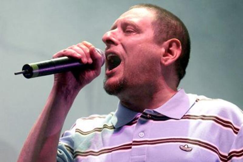 Front man Shaun Ryder for the English alternative rock band The Happy Mondays,  perform on the Channel 4 Stage during the V Festival at Hylands Park in Chelmsford, England, Saturday Aug. 18, 2007. (AP Photo / Yiu Mok, PA) ** UNITED KINGDOM OUT - NO SALES - NO ARCHIVES **