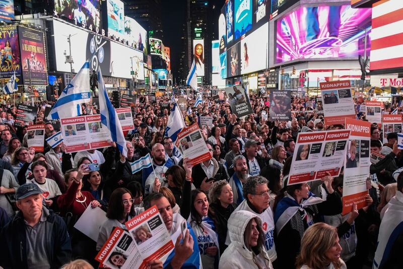 Protesters call for the release of hostages held by Hamas during a demonstration in the Times Square district of New York. Bloomberg