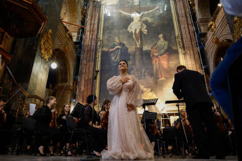 The Academy Symphony Orchestra of the Luhansk Regional Philharmonic performs during a charity concert in support of the armed forces of Ukraine, in Lviv. Getty Images
