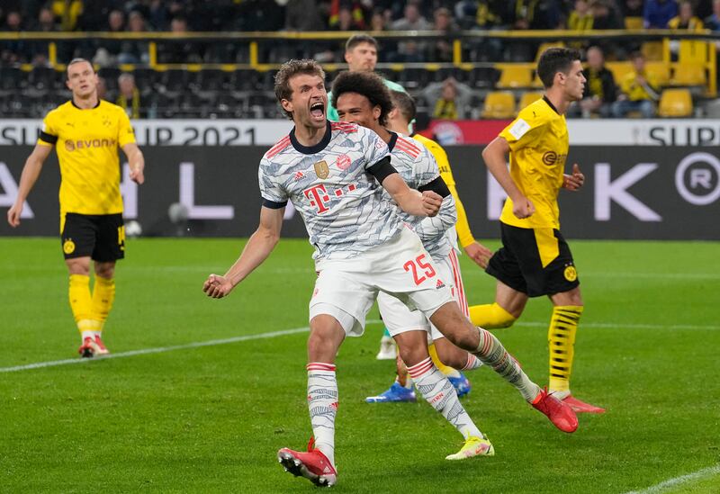 Thomas Muller celebrates after scoring Bayern's second goal.