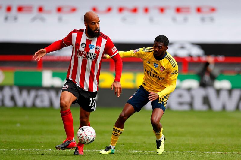 David McGoldrick - 7: God loves a trier, and the Sheffield United striker was in the right place to take advantage of shambolic Arsenal defending for the equaliser. AFP