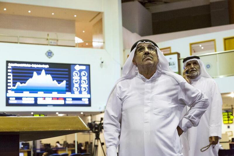 Currency pegs to the US dollar or a basket of major currencies provide a major policy anchor for GCC countries. Above, traders at the Dubai Financial Market. Duncan Chard for The National