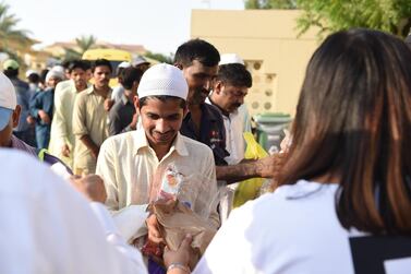 A Dubai community is giving away up to 1,200 iftar packs a night throughout Ramdan, and will continute to give with Eid packs. Alex Jeffries Photography Group