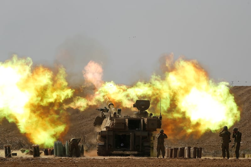 An Israeli artillery unit fires towards Gaza. A UN resolution on Friday warned against large-scale military operations in the city of Rafah. EPA