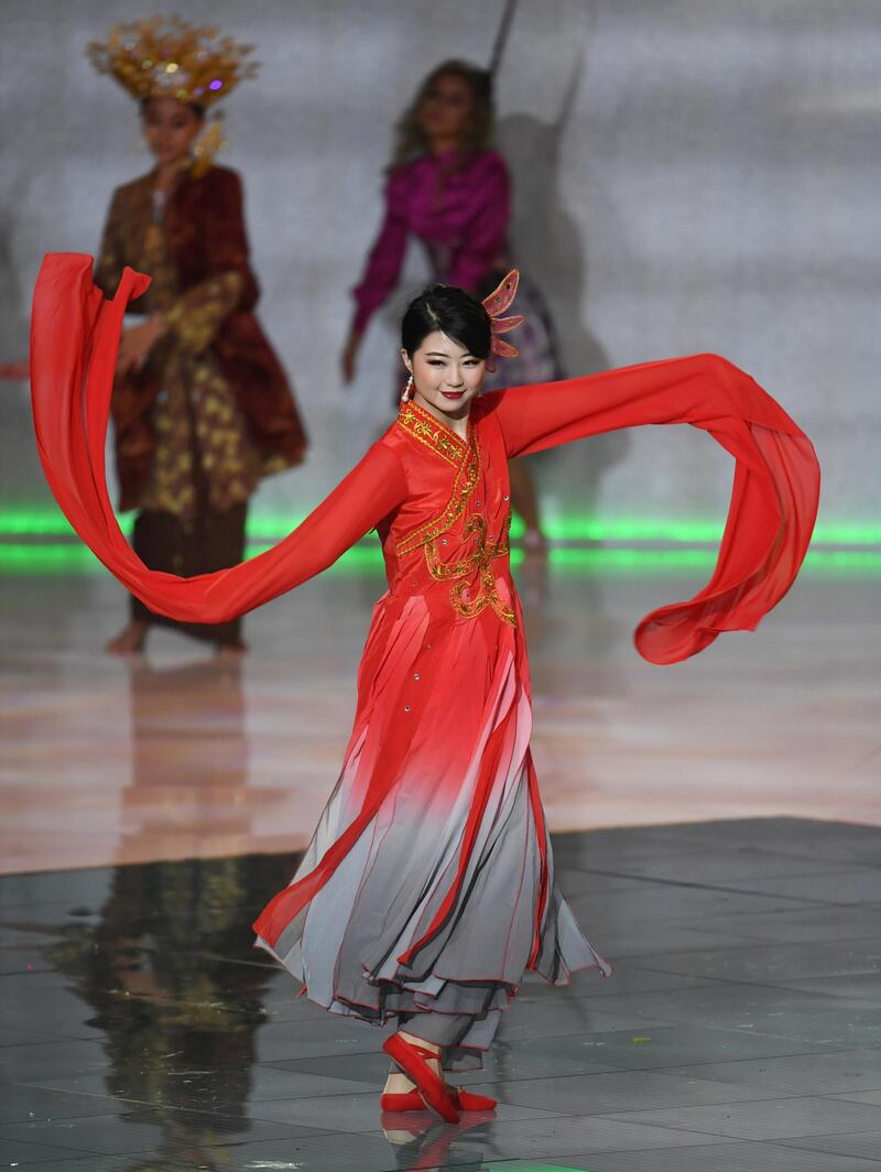 Miss Macau Yu Yanan performs during the final in the ExCel centre in London.  EPA