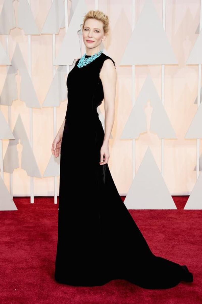 Cate Blanchett, never one to look either boring or too try hard, paired a subtle black Maison Martin Margiela gown with a standout turquoise statement necklace to exceptional effect. As one of the few actresses to wear black this year, Blanchett was evidence that an LBD can be far from boring. Jason Merritt / Getty Images / AFP