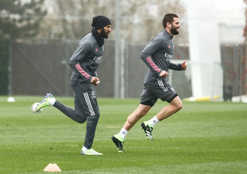MADRID, SPAIN - NOVEMBER 18: Karim Benzema and Nacho in action at Valdebebas training ground on November 18, 2020 in Madrid, Spain. (Photo by Helios de la Rubia/Real Madrid via Getty Images)