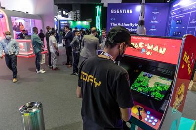 An arcade game installed to entertain visitors at the floor of Gisec Global 2022 at the Dubai World Trade Centre on Monday. Antonie Robertson / The National
