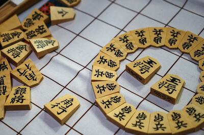 Japanese shogi chess pieces arranged for a photograph at Heroz Inc.'s headquarters in Tokyo, Japan, on Thursday, June 28, 2018. In April, Heroz listed on a startup market on the Tokyo Stock Exchange. The shares opened 11 times higher than the IPO price, the best ever start of trading by a Japanese listed company. Photographer: Kentaro Takahashi/Bloomberg