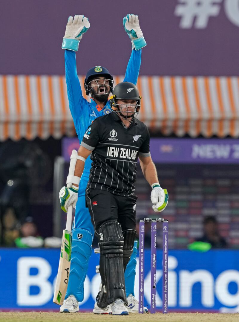 India's wicketkeeper KL Rahul, left, appeals successfully for LBW against New Zealand's captain Tom Latham. AP 