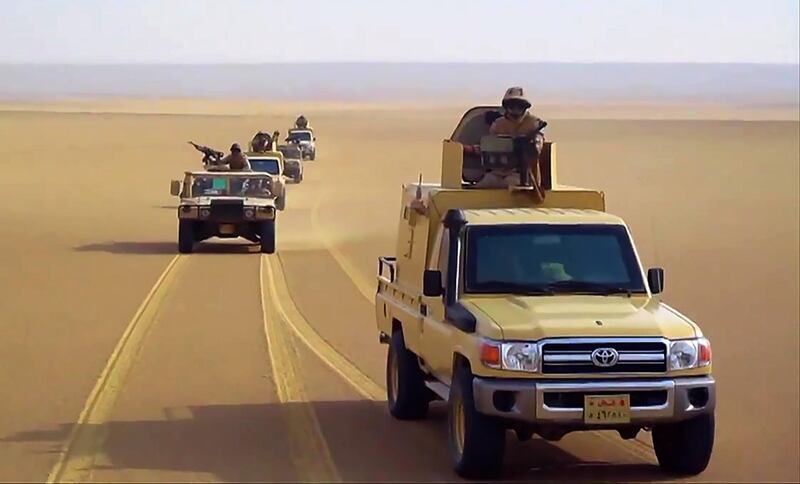 An image grab taken from a handout video released by the official Facebook page of Egypt's Military Spokesman on December 8, 2020 shows an Egyptian army pickup trucks and humvees (High Mobility Multipurpose Wheeled Vehicles - HMMWVs) driving in the desert. Residents of Egypt's restive North Sinai region ran for their lives when an Islamic State group affiliate occupied their villages. Now, they are returning to find their homes booby-trapped. The IED attacks that have multiplied in the vast, remote and sparsely populated region which authorities have declared off-limits to journalists recall those the IS launched to sow terror in Iraq and Syria. - RESTRICTED TO EDITORIAL USE - MANDATORY CREDIT "AFP PHOTO / EGYPTIAN DEFENCE MINISTRY" - NO MARKETING NO ADVERTISING CAMPAIGNS - DISTRIBUTED AS A SERVICE TO CLIENTS


 / AFP / EGYPTIAN DEFENCE MINISTRY / - / RESTRICTED TO EDITORIAL USE - MANDATORY CREDIT "AFP PHOTO / EGYPTIAN DEFENCE MINISTRY" - NO MARKETING NO ADVERTISING CAMPAIGNS - DISTRIBUTED AS A SERVICE TO CLIENTS


