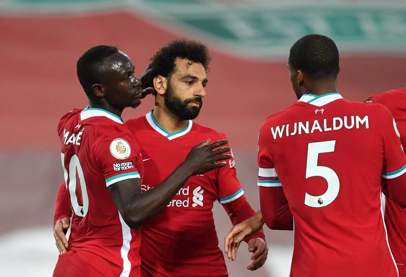 Liverpool's Sadio Mane, left, celebrates with Mohamed Salah. AP