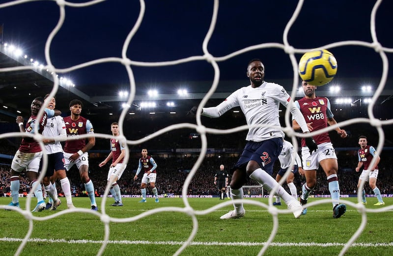 BIRMINGHAM, ENGLAND - NOVEMBER 02: Divock Origi of Liverpool watches a shot by Sadio Mane of Liverpool (not pictured) cross the line for him to score his team's second goal during the Premier League match between Aston Villa and Liverpool FC at Villa Park on November 02, 2019 in Birmingham, United Kingdom. (Photo by Marc Atkins/Getty Images)