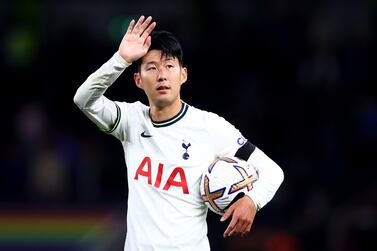 LONDON, ENGLAND - SEPTEMBER 17: Son Heung-Min of Tottenham Hotspur celebrates victory with their hat-trick match ball after the Premier League match between Tottenham Hotspur and Leicester City at Tottenham Hotspur Stadium on September 17, 2022 in London, England. (Photo by Clive Rose / Getty Images)