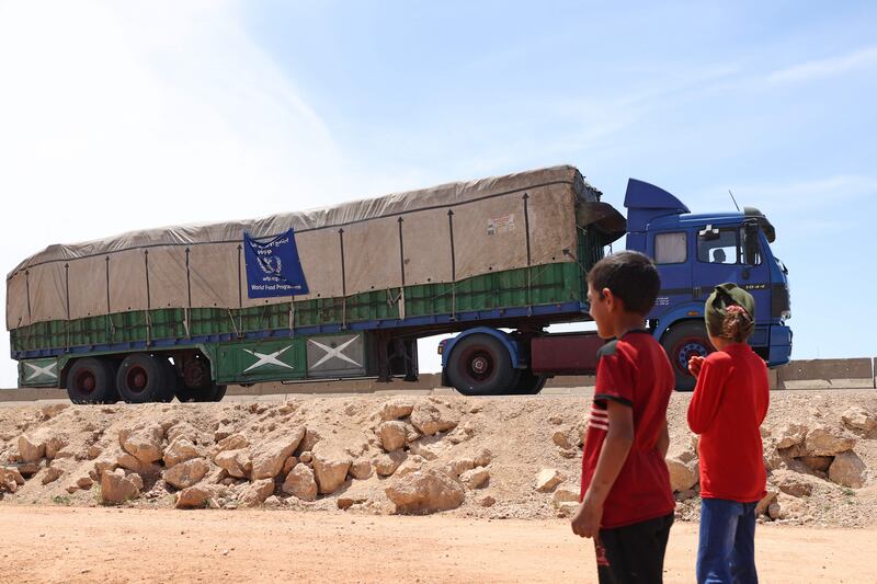 A lorry carrying aid packages drives through Hazano in the rebel-held northern countryside of Syria's Idlib province. AFP