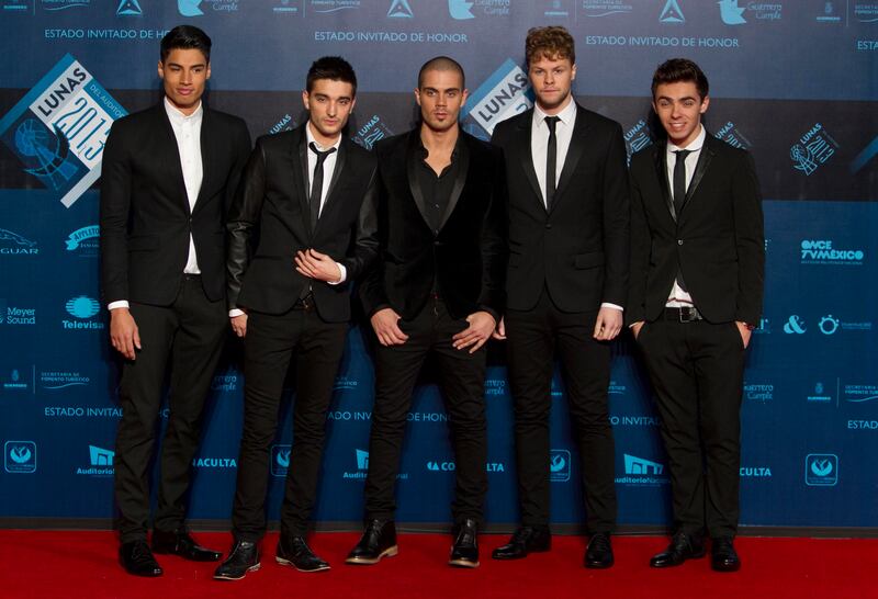 Parker, second left, with fellow band members, from right, Nathan Sykes, Jay McGuiness, Max George and Siva Kaneswaran. AP