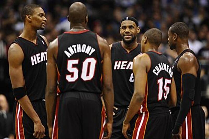 The Heat’s LeBron James, third from left, will face angry Cleveland fans on Thursday.