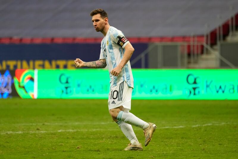 Lionel Messi celebrates scoring his penalty against Colombia during the shootout.