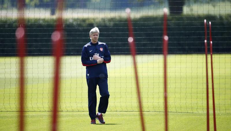 Arsenal manager Arsene Wenger attends a training session at London Colney on May 14, 2014. Arsenal will meet Hull City in the final of the English FA Cup on Saturday. Eddie Keogh / Reuters