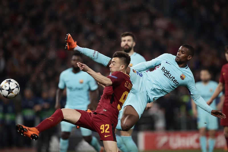Barcelona defender Nelson Semedo, right, vies for the ball with Roma forward Stephan El Shaarawy during their Uefa Champions League quarter-final second-leg match in Rome. Isabella Bonotto / AFP