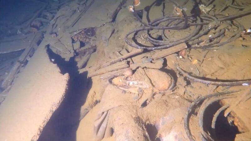 A shoe, centre, found inside the Ines wreck off the coast of Fujairah. Courtesy Simon Nadim / XR Hub