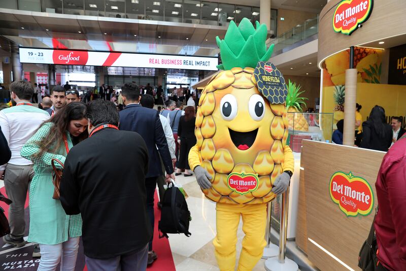 A pineapple brand mascot.