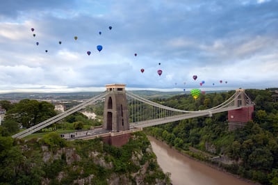 Bristol Balloon Fiesta flies over the Clifton Suspension Bridge. Photo: Gary Newman