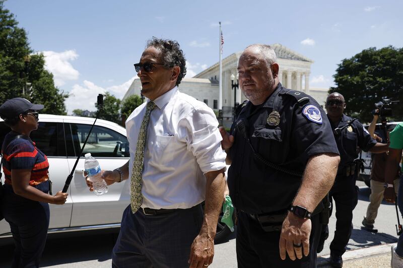  Andy Levin is detained by police. AFP