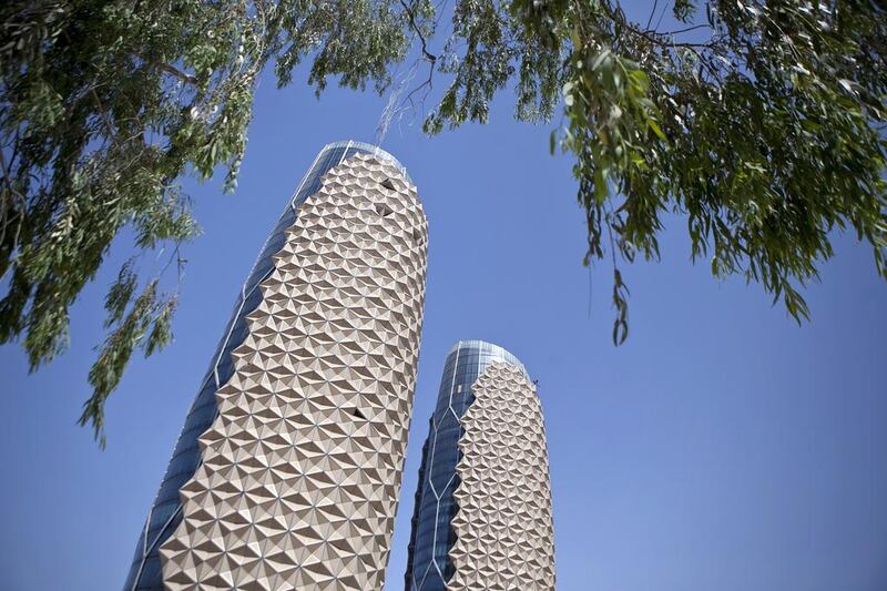 The Al Bahr Towers in Abu Dhabi use a solar shading system that features a computer-controlled facade made up of thousands of translucent units.  Umbrellas connected to motors open and shut depending on where the sunlight is create an eco friendly building. The towers, on the corner of Saada and Salam Streets in Abu Dhabi will house the offices for the Abu Dhabi Investment Council. Silvia Razgova / The National
