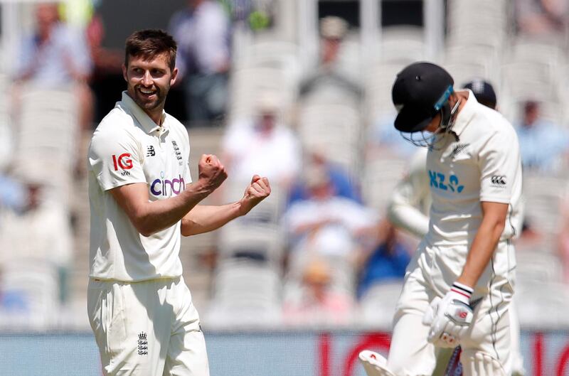 England fast-bowler  Mark Wood celebrates after taking the wicket of New Zealand's Mitchell Santner for a duck. Reuters